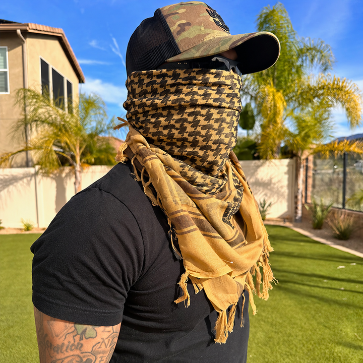 coyote shemagh scarf worn outdoors with plain clothing