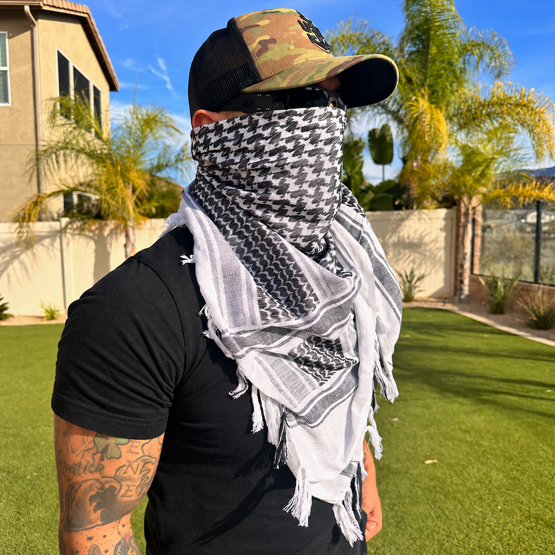 white shemagh scarf worn outdoors with plain clothing